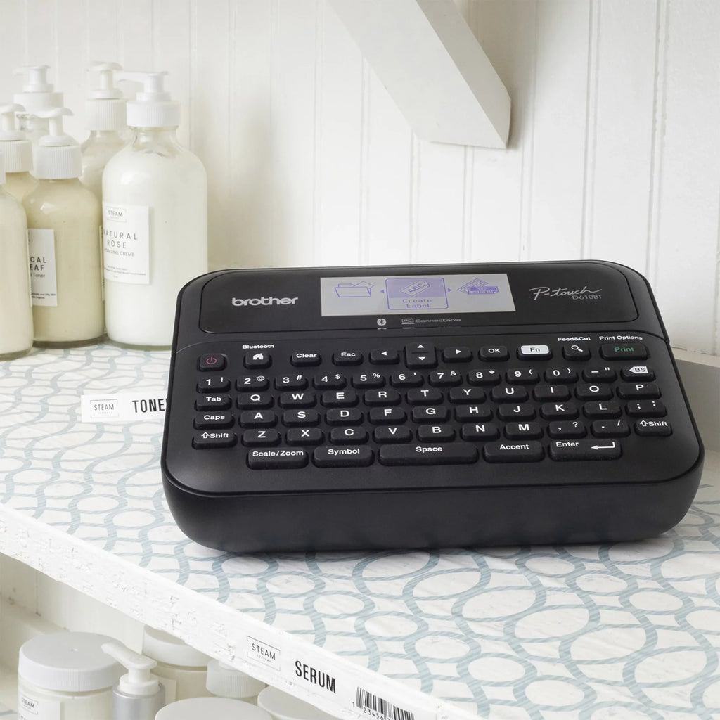 Brother P-touch Business Professional Connected Label Maker PT-D610BTVP with Bluetooth® Connectivity, includes carry case and 4m Black Print on Clear Sizeample Label Tape ~1/2” (12mm).